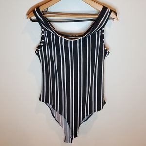 Black and white striped body suit